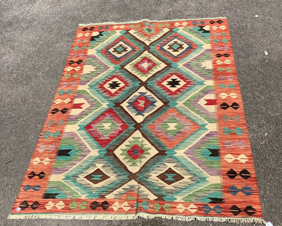 An Anatolian design polychrome flatweave Kilim carpet, 212 x 152cm